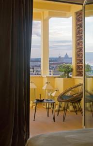 a hotel room with a view of the city at Starhotels Metropole in Rome