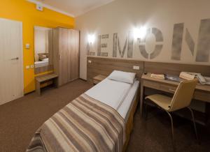 Postel nebo postele na pokoji v ubytování Raziotel Kyiv (Boryspilska)