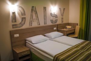 Postel nebo postele na pokoji v ubytování Raziotel Kyiv (Boryspilska)