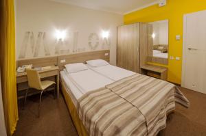 Postel nebo postele na pokoji v ubytování Raziotel Kyiv (Boryspilska)