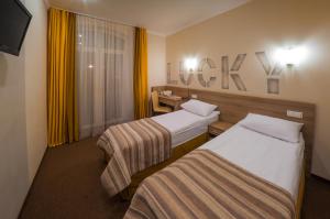 Postel nebo postele na pokoji v ubytování Raziotel Kyiv (Boryspilska)