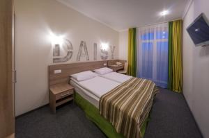 Postel nebo postele na pokoji v ubytování Raziotel Kyiv (Boryspilska)