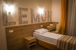 Postel nebo postele na pokoji v ubytování Raziotel Kyiv (Boryspilska)