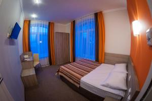 Postel nebo postele na pokoji v ubytování Raziotel Kyiv (Boryspilska)