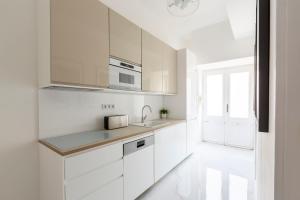 A kitchen or kitchenette at Exclusive Downtown Apartment in the Heart of Budapest