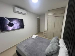 Postel nebo postele na pokoji v ubytování Hermoso apartamento para descansar en familia