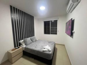 Postel nebo postele na pokoji v ubytování Hermoso apartamento para descansar en familia