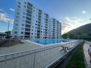 Bazén v ubytování Hermoso apartamento para descansar en familia nebo v jeho okolí