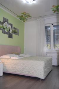 Posteľ alebo postele v izbe v ubytovaní Orchidea