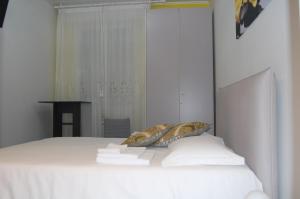 Posteľ alebo postele v izbe v ubytovaní Orchidea