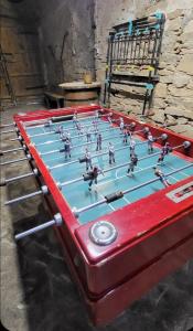 a foosball table with toy soldiers on it at Can Manuel in Gabet
