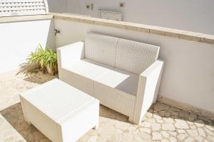 Istumisnurk majutusasutuses Appartamenti in Via Schipa Pescoluse