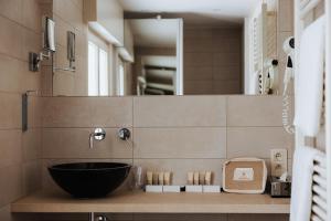 Koupelna v ubytování Hotel Lugano