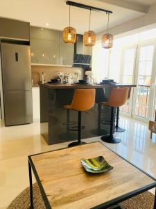 Køkken eller tekøkken på Casa Carmela Fuengirola