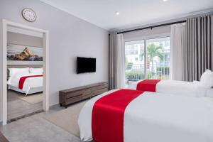 Postel nebo postele na pokoji v ubytování Ramada by Wyndham St Kitts Resort