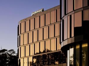 a building with a sign on top of it at Pullman Sydney Penrith in Penrith