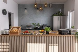Kuchyň nebo kuchyňský kout v ubytování Hotel AMITY
