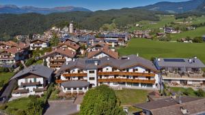 an aerial view of a town with houses at Residence Viktoria in Castelrotto