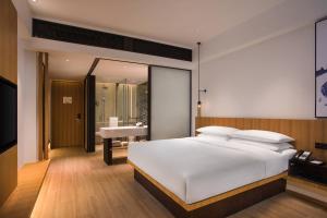 Postel nebo postele na pokoji v ubytování Fairfield by Marriott Jingdezhen