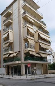 a tall building with a stop sign in front of it at Casa Luna in Thessaloniki
