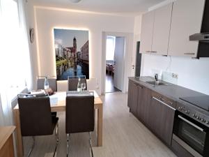 Kuchyň nebo kuchyňský kout v ubytování Ferienwohnung Am Altstadtring