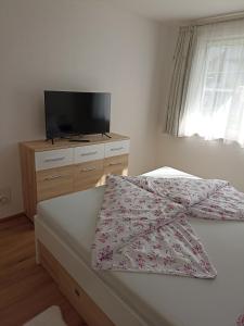 Postel nebo postele na pokoji v ubytování Apart ban Voltas