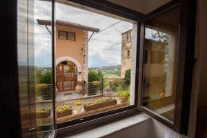 Nespecifikovaný výhled na hory nebo výhled na hory při pohledu z apartmánu + 5 fotografií