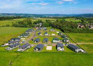 an aerial view of a large estate with houses at Heathergate Boutique Holiday Park in Hexham