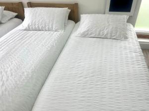 Great Studio near Airport - SUPER HOST 2 YEARS RUNNING!客房内的一张或多张床位
