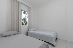 Posteľ alebo postele v izbe v ubytovaní Apartamento 2 quartos no Buritis