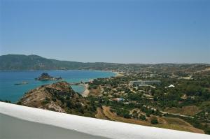 a view of a beach and water from an airplane at Panorama Studios in Kefalos