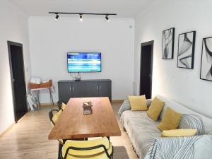 A television and/or entertainment centre at A&G Apartment