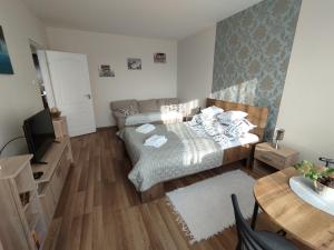 Posteľ alebo postele v izbe v ubytovaní The Budapest View Apartment