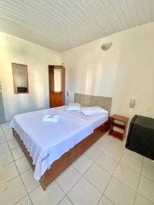 Voodi või voodid majutusasutuse Felicità Praia Hotel toas