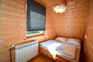 Postel nebo postele na pokoji v ubytování Wspólna Chata
