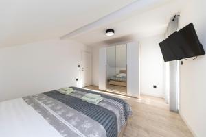 Posteľ alebo postele v izbe v ubytovaní Family apartments Zadar - Ryanair's September