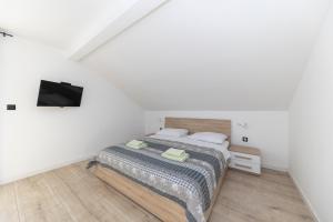 Posteľ alebo postele v izbe v ubytovaní Family apartments Zadar - Ryanair's September