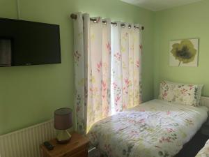 Postel nebo postele na pokoji v ubytování ANNORA Bar & Accommodation