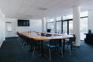 a large conference room with a long table and chairs at Le Drip's in Marseille +46 photos