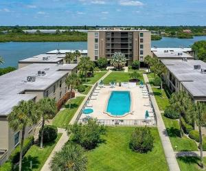 an aerial view of a resort with a swimming pool at Sea Club Condo #405 in Clearwater Beach