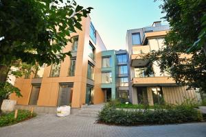 a group of buildings in a city at Prestige Sopot Residence by 3City Rentals in Sopot