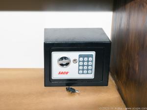 a small clock sitting on top of a table at Luxury Apartments Nauyaca by Paradiselodge in Platanillo