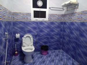 Koupelna v ubytování Hotel Ain Safnan Room&Flats فندق عين صفنان غرف&شقق