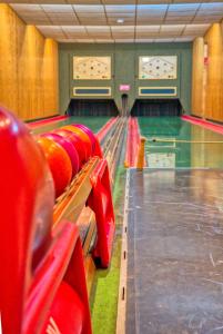 a row of lanes in a bowling alley at Hotel National in Bad Düben