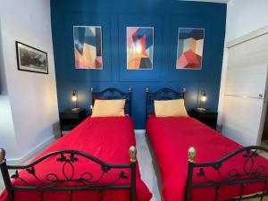 Postelja oz. postelje v sobi nastanitve Stylish Valletta Apartment