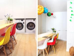 a kitchen and dining room with a washing machine and a table and chairs at Oasis urbano en el corazón financiero / Castellana in Madrid