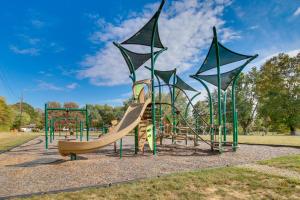 a playground with a slide in a park at Pet-Friendly Ohio Escape with Patio, Near Downtown! in Dayton