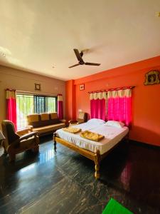 מיטה או מיטות בחדר ב-Gokarna cross stay