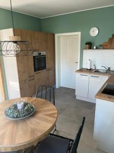 Kuchyň nebo kuchyňský kout v ubytování Ferienwohnung Basaltliebe Mendig