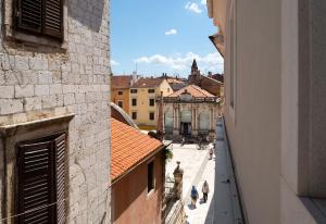 a view of a city street from a building at Art Hotel Kalelarga in Zadar